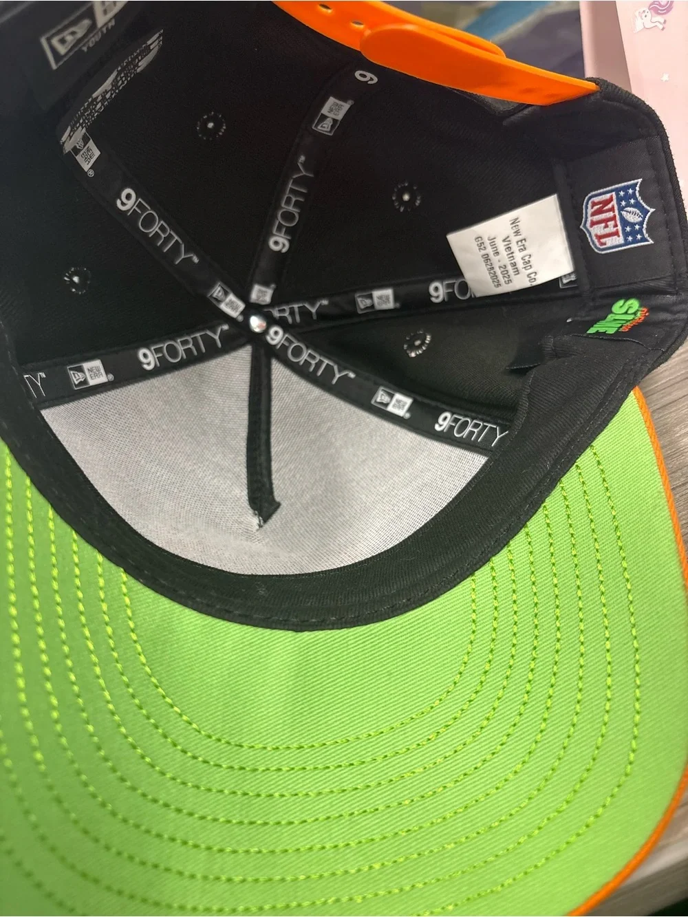 New Era Kids Orange and Black Baseball Cap with Green Embroidery